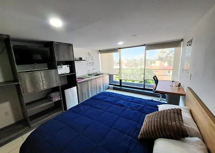 S09 SUITE KING Premium Suite TEC CEM Cocineta WiFi Balcón Parking Terraza