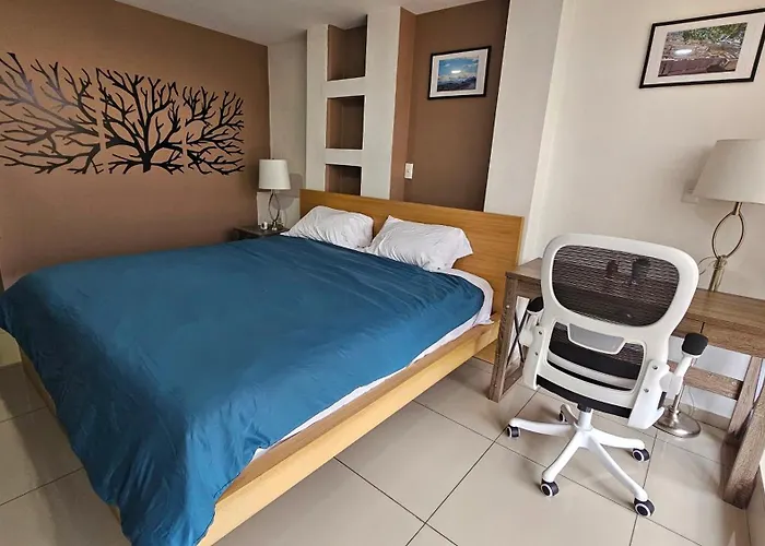 S06 SUITE DOBLE Premium Suite TEC CEM con Cocineta WiFi Balcón Parking Terraza